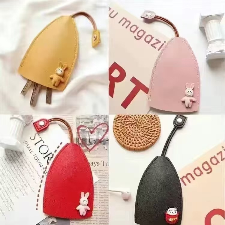 Fashionable and fashion creative pull out fashion cartoon cute personality women s car key bag designer fashionable and trendy men s key bag