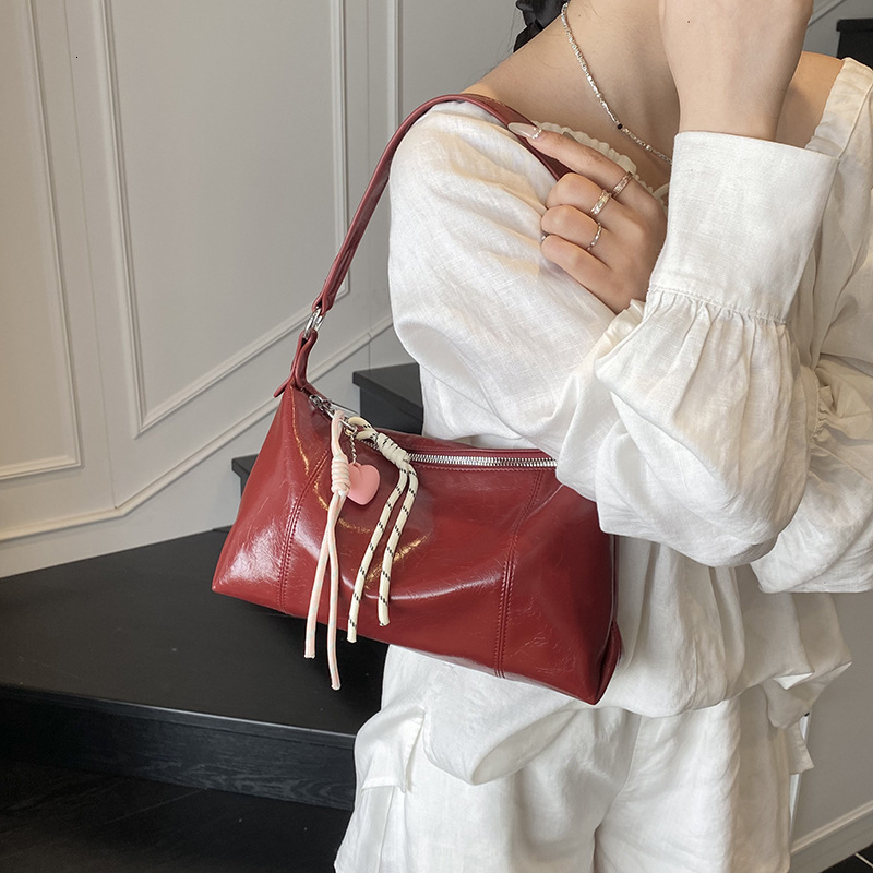 2025 New Large Capacity Fashion Versatile Commuter Underarm Soft Leather Simple Handbag Casual Shoulder Bag for Women