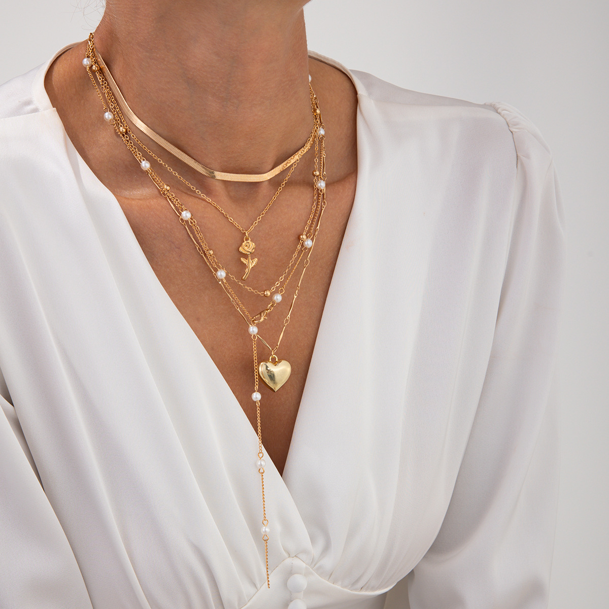 Sweet and cool ins rose heart shaped collarbone with temperament imitating pearl snake bone chain layered necklace
