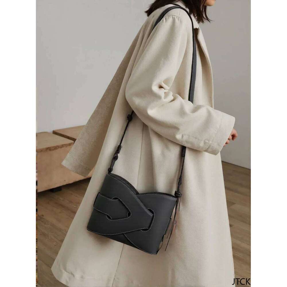 Bold Or Bust: Graphic Print Bucket Bag For The Unapologetically Extra