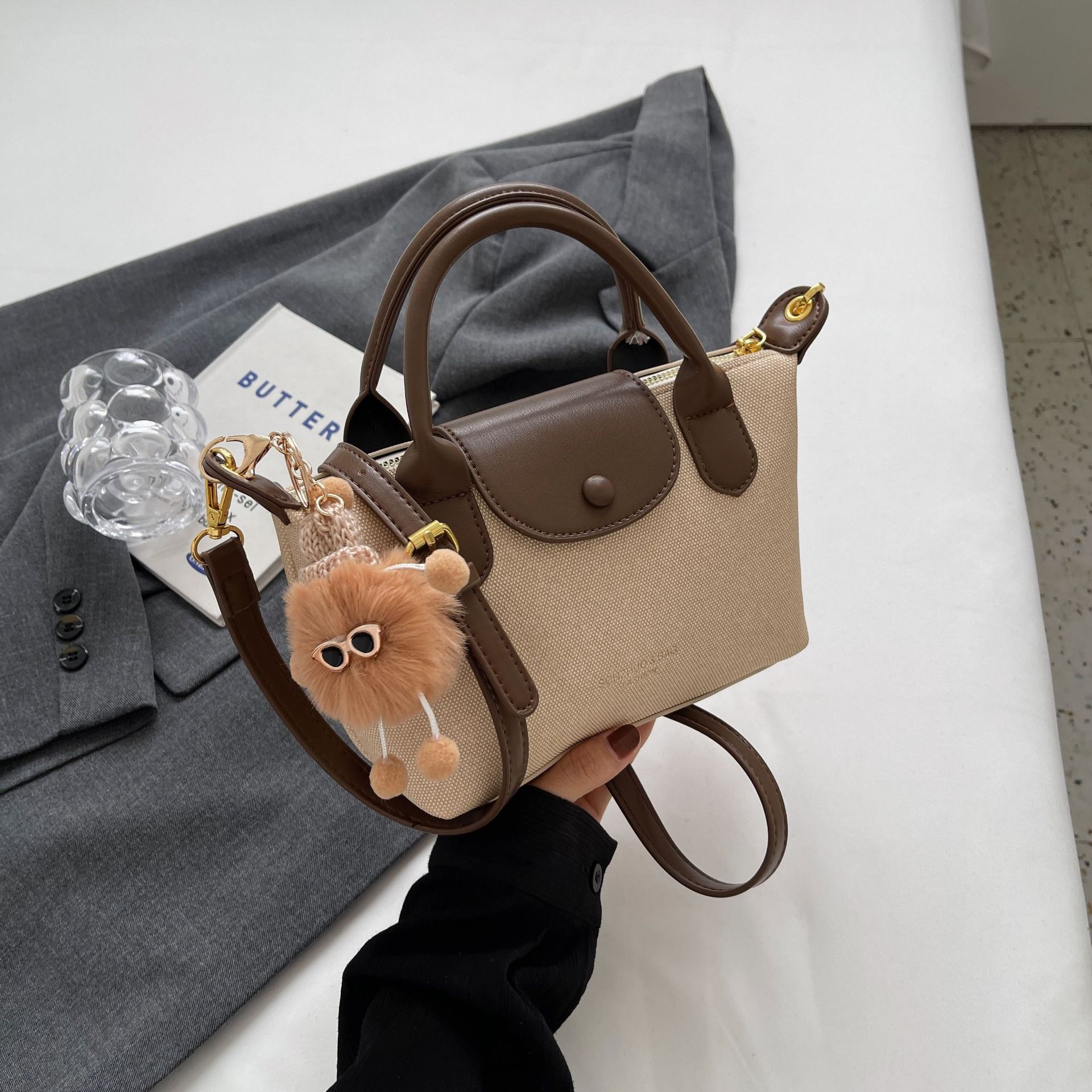 This year's popular minimalist dumpling 2024 new dragon bags Xiang high-end texture hand-held splicing single shoulder crossbody bag