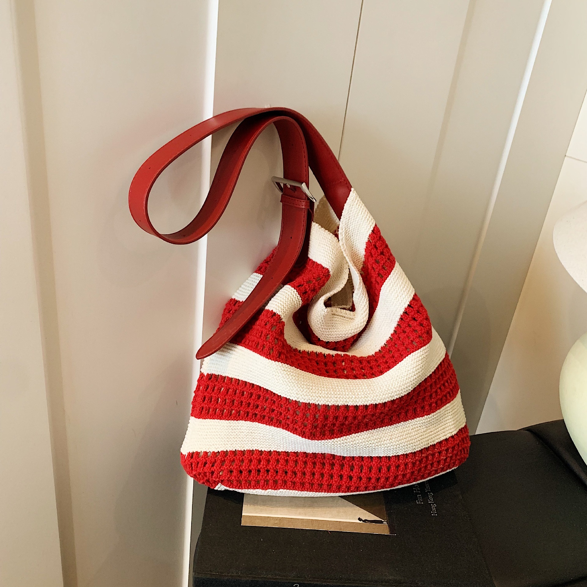 2025 Spring And Summer Striped Woven Bag Niche Design Contrast Color Striped Knitted Bag Women's Simple Hollow Hand-held Shoulder Bag