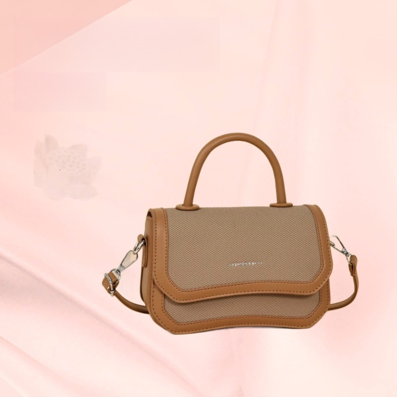 Top quality brand free delivery designer handbag 2025 new splicing color fashionable multifunctional single shoulder crossbody bag new free delivery d