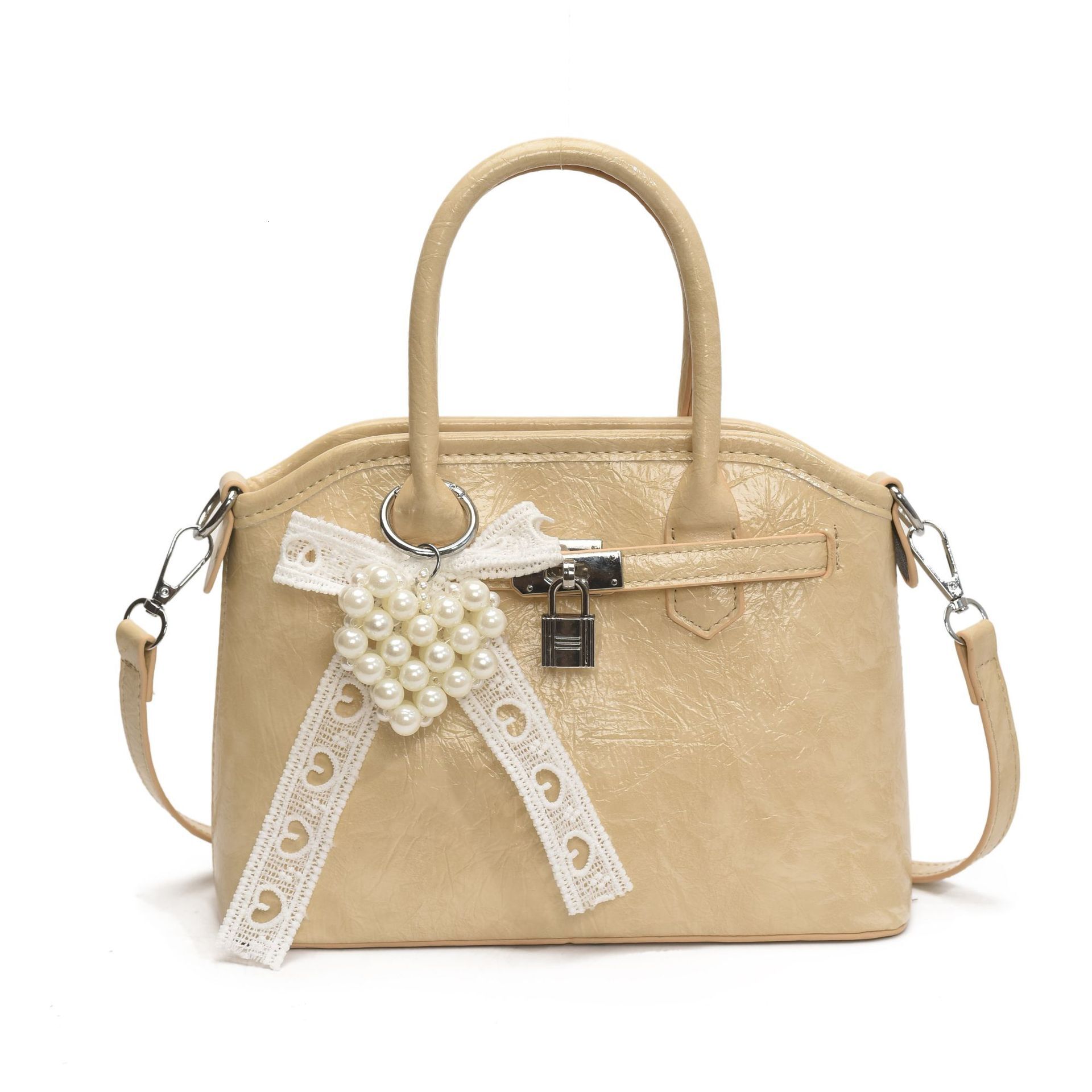 Niche Bowknot Pearl Handbag for Women 2025 New Simple Fashion Shell Commuter Shoulder Crossbody Bag