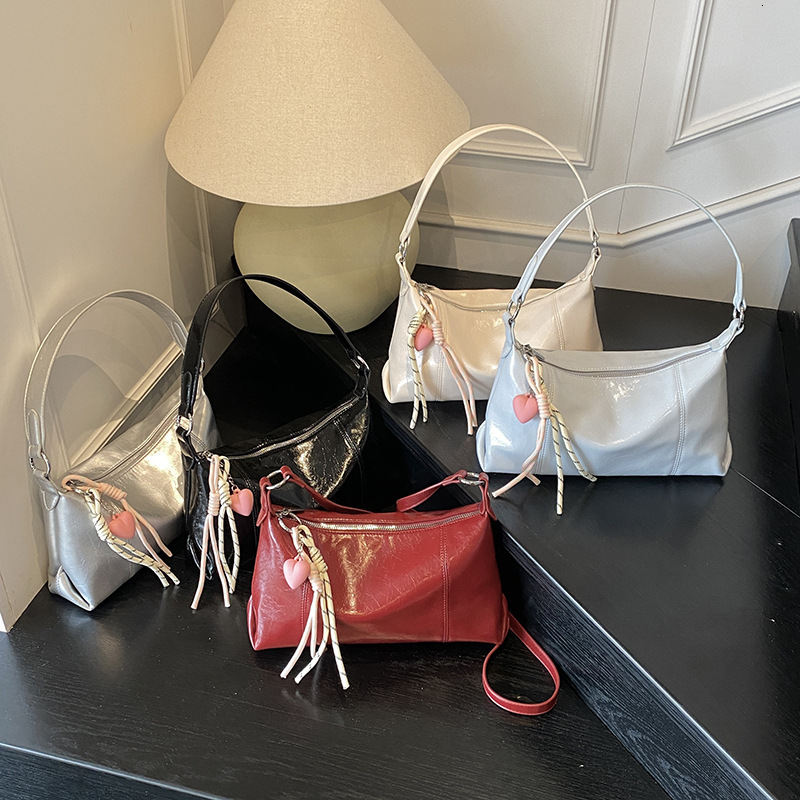 2025 New Large Capacity Fashion Versatile Commuter Underarm Soft Leather Simple Handbag Casual Shoulder Bag for Women