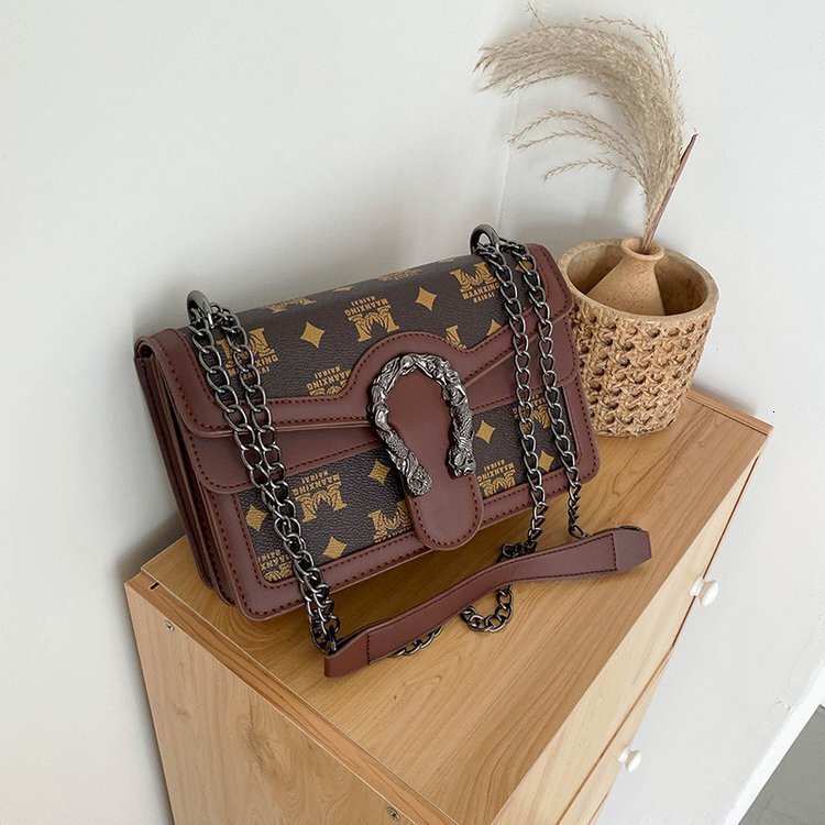 Top brand high-quality new free designer bag 2025 new fashionable casual fashionable printed shoulder chain new free designer bag