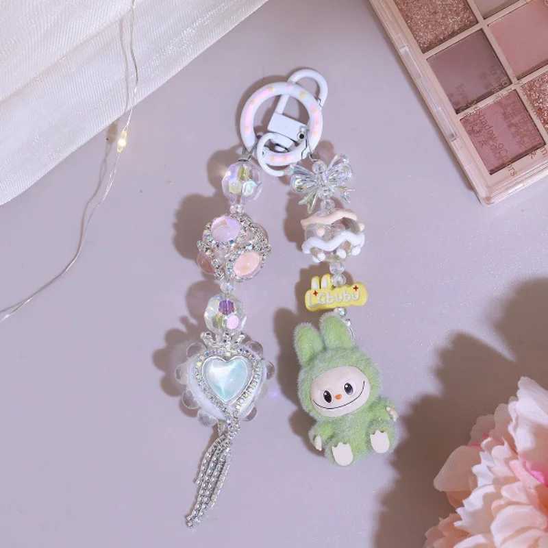 Cute Labubu Keychain Doll Couple Keyring Kawaii Cartoon Bowknot Phone Chain Bag Heart Pendant Charm Backpack Decoration Gift W250526