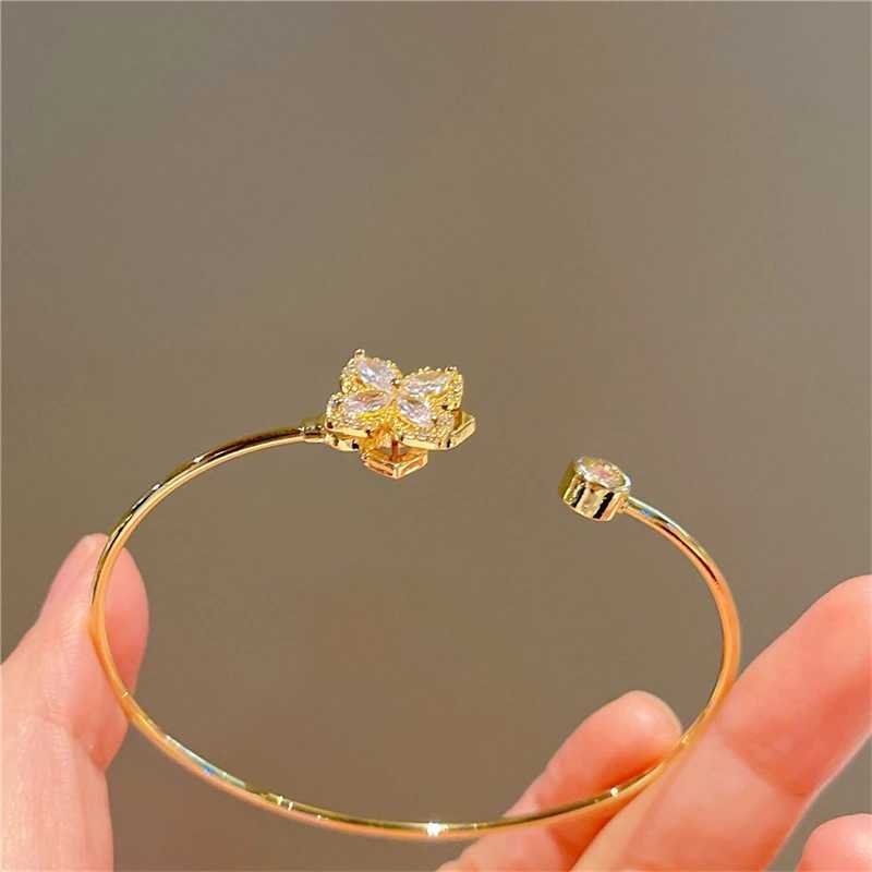 Luxury Rotable Zircon Four Leaf Grass Gold Color Copper Open Bracelets for Women New Fashion Advanced Wedding Party Jewelry Gift W250526