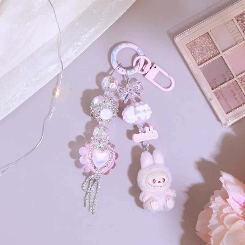 Cute Labubu Keychain Doll Couple Keyring Kawaii Cartoon Bowknot Phone Chain Bag Heart Pendant Charm Backpack Decoration Gift W250526