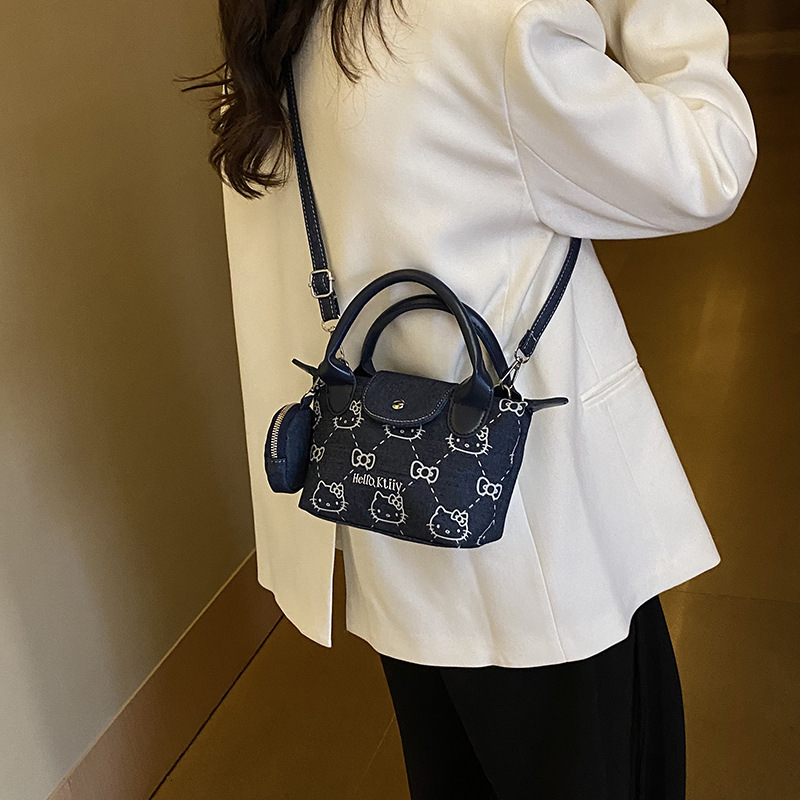 Top brand high-quality new free designer bag 2025 new fashionable printed handbag commuting soft leather casual shoulder width bag new free designer b
