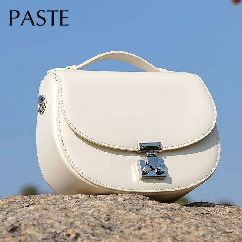 Designer Bag Original Design Beige Color Round Shape Saddle Flap Hard Cow Leather Women Shoulder Crossbody Bag Small