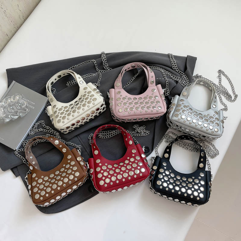 High quality brand new free designer bag 2025 new rivet fashion shoulder bag commuting bucket armpit bag handbag new free designer bag