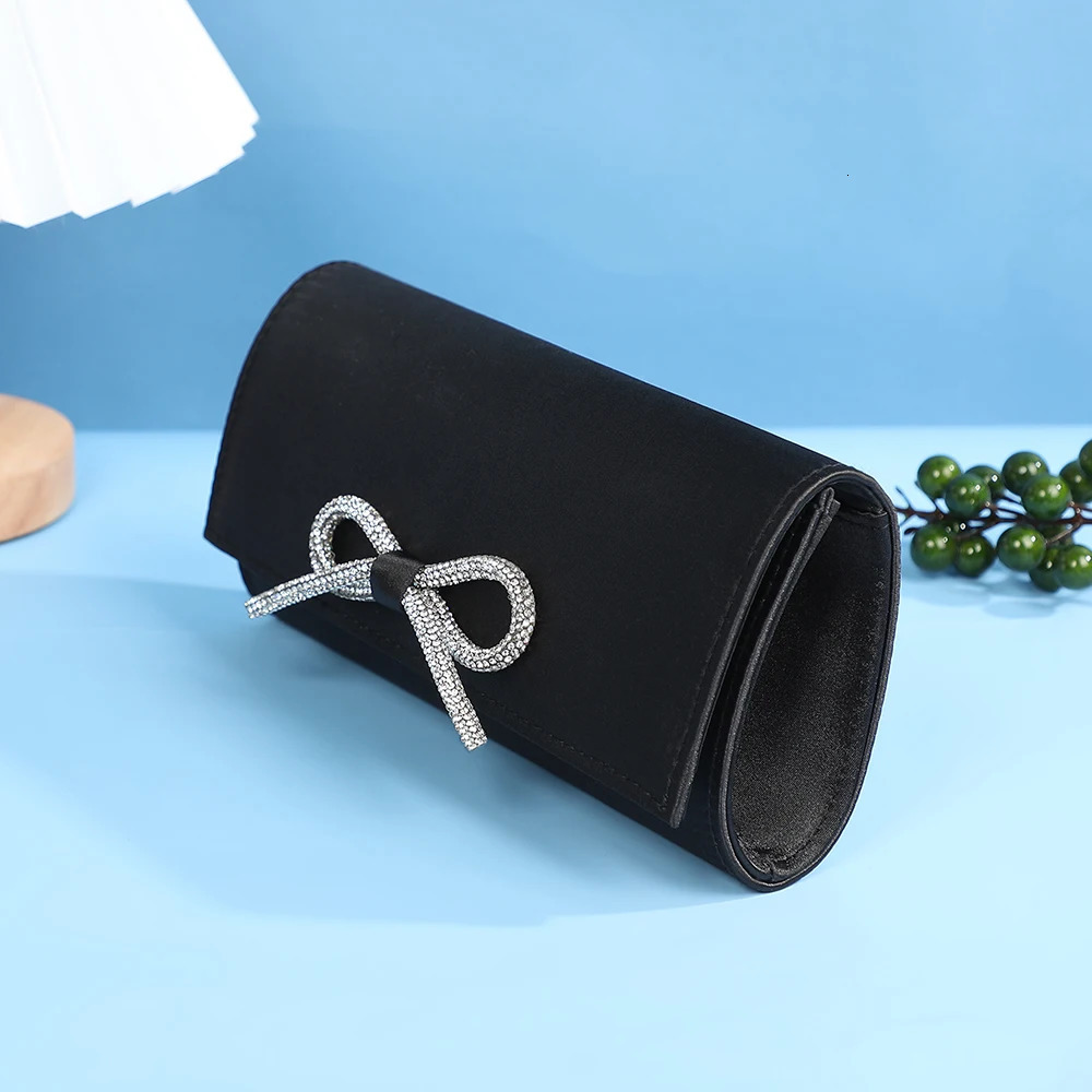 Simple High Quality Solid Color Fashion Evening Clutch bag Rhinestone Bow Temperament Party Wedding hand bag Simpl 250526