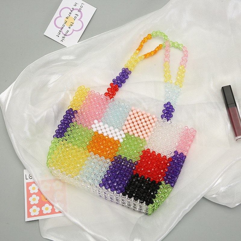 Brand High Quality New Style Creative Color-Block Handheld Pearl and Style Internet Celebrity Handwoven Pearl Woven Tote Elegant Decorative Storage Ne