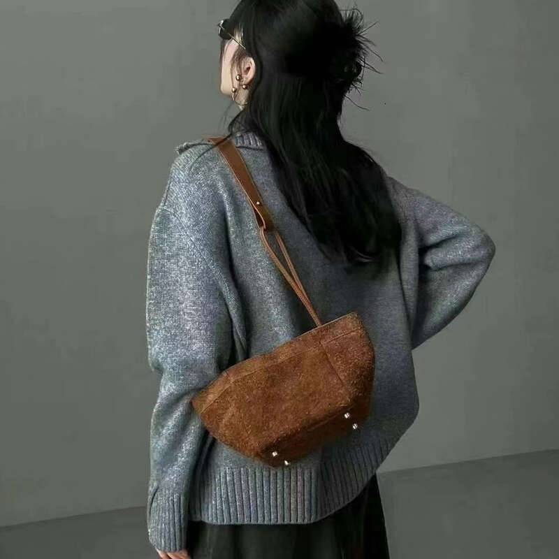 Top Layer Cowhide Niche Genuine Leather Wing Tote for Women New High end Handheld Shoulder Crossbody Bucket Bag