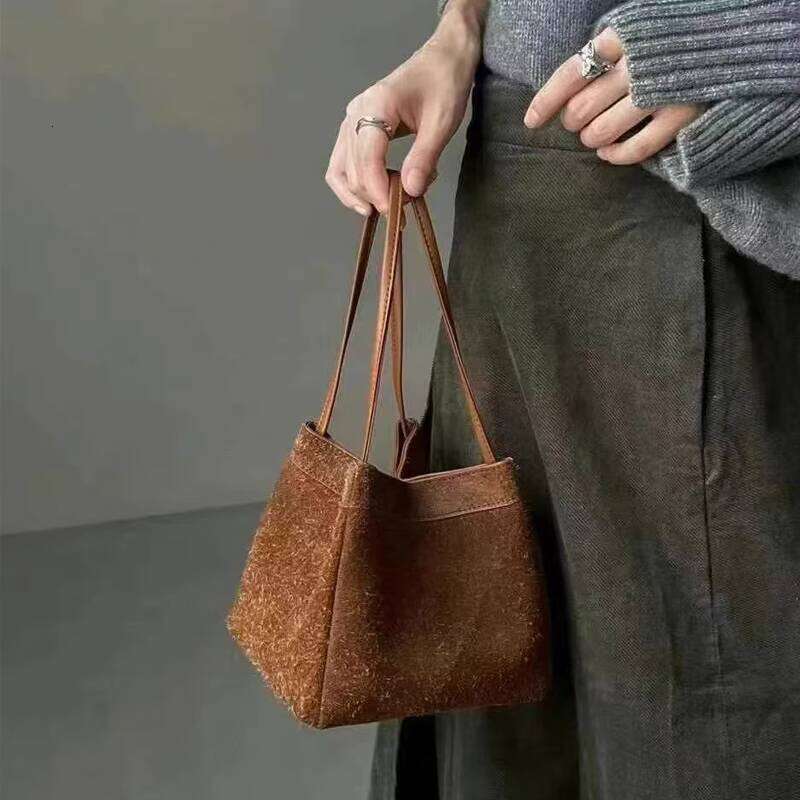 Top Layer Cowhide Niche Genuine Leather Wing Tote for Women New High end Handheld Shoulder Crossbody Bucket Bag