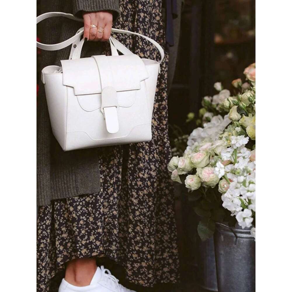 Early Spring New Ouyang Nana Style Commuter Niche Design Handheld Crossbody Shoulder Multi functional Women s Bag