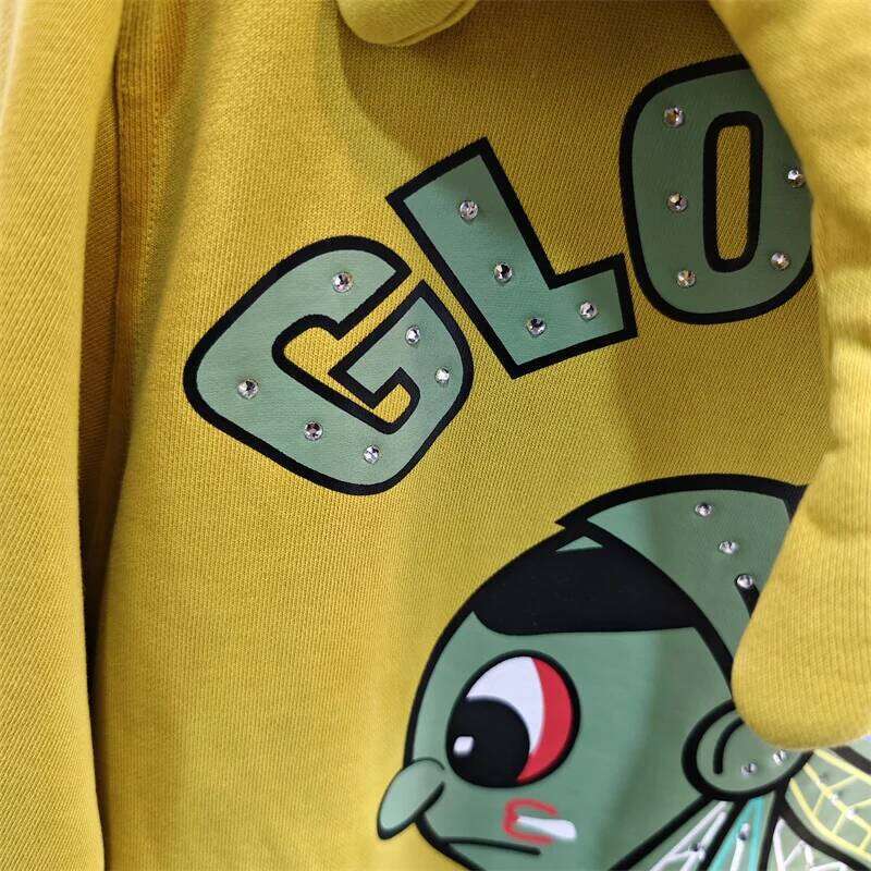 High-Quality Cotton Hoodie With Cartoon Graphic Print Rhinestones Deco For Glo Gang Lovers In Yellow And Gray