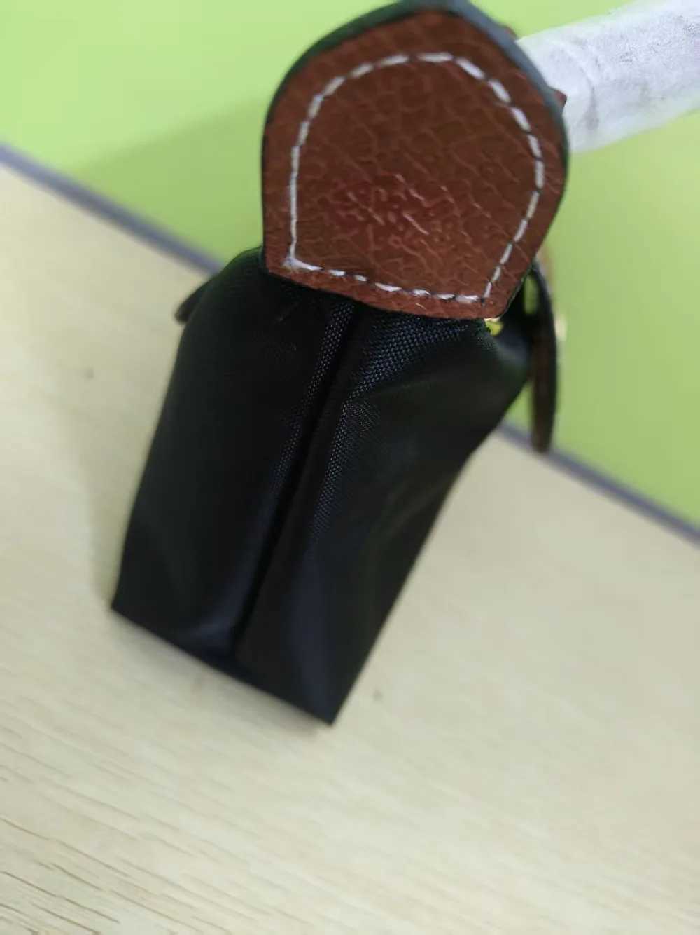 France unique perforated multifunctional large capacity new Mini nylon shoulder bag Z250527