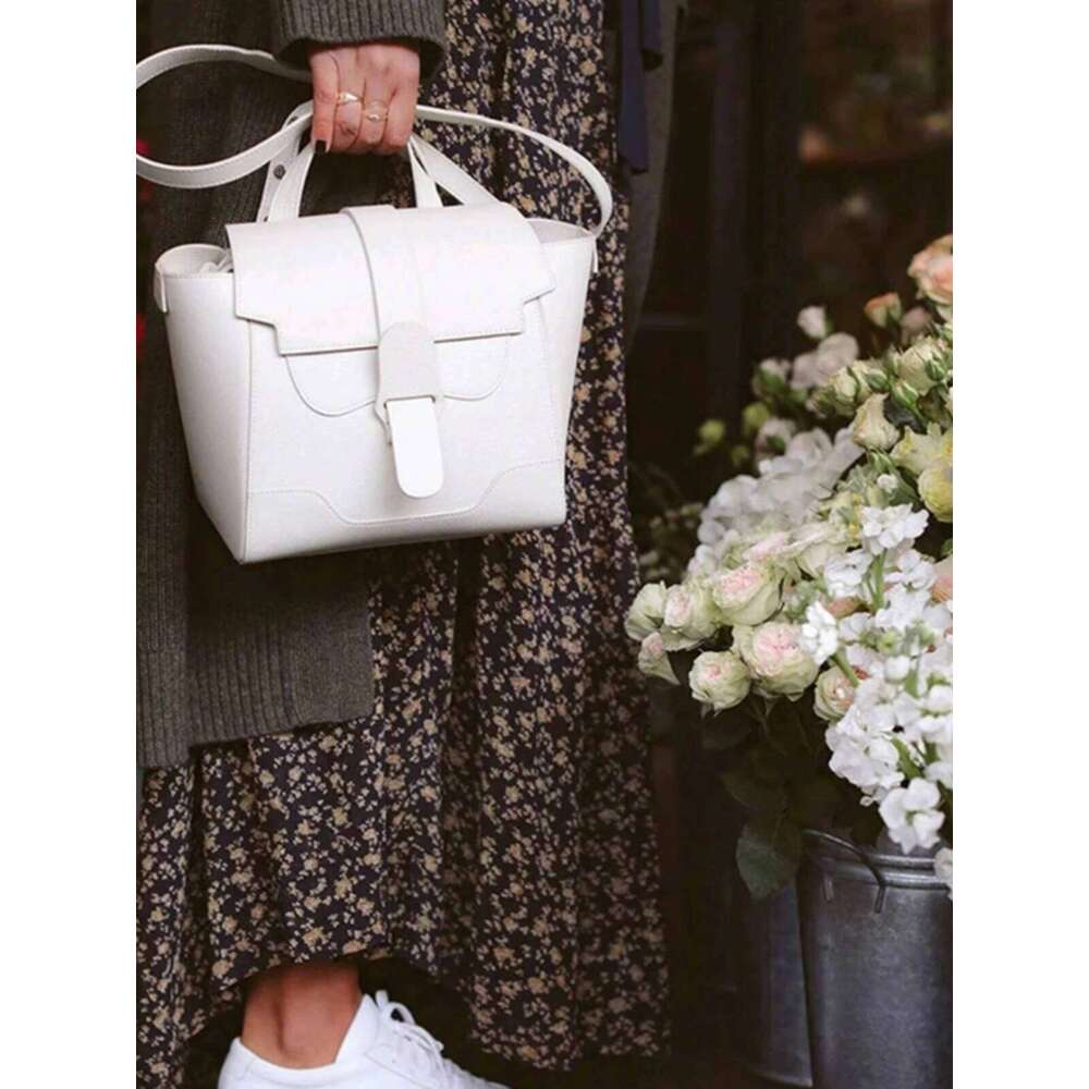 Early Spring New Ouyang Nana Style Commuter Niche Design Handheld Crossbody Shoulder Multi functional Women s Bag