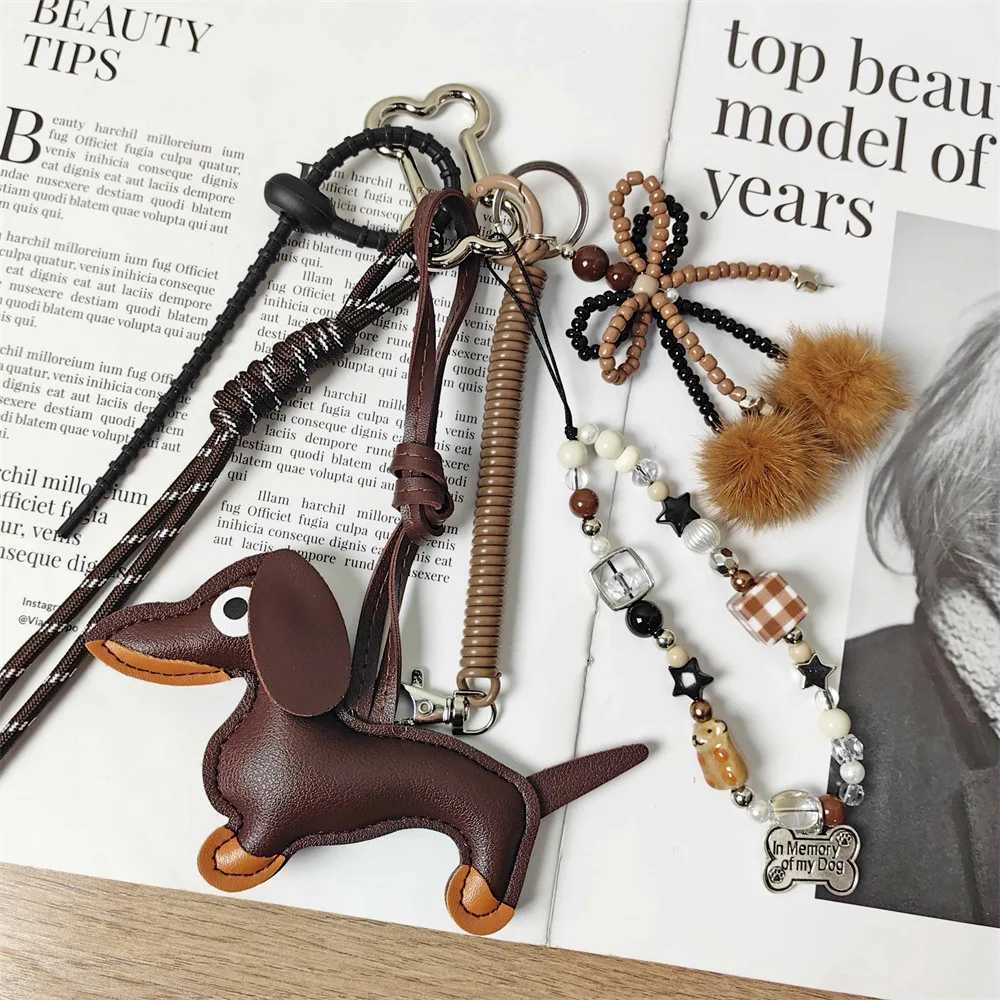 Handmade Baseball Personality Keychain Creative Simple Soda Bread Fringe Trend Accessories Dachshund Dog Bow Hairball Bag Pendant W250526