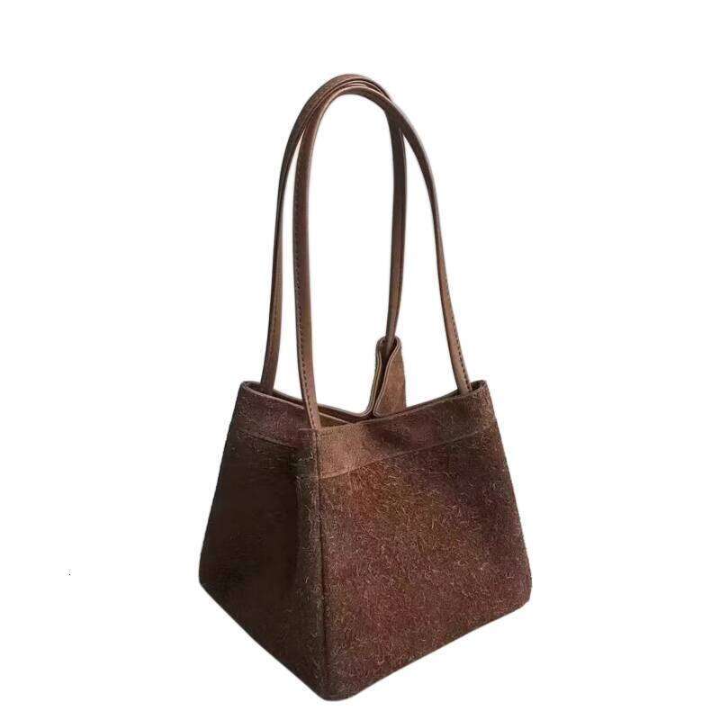 Top Layer Cowhide Niche Genuine Leather Wing Tote for Women New High end Handheld Shoulder Crossbody Bucket Bag
