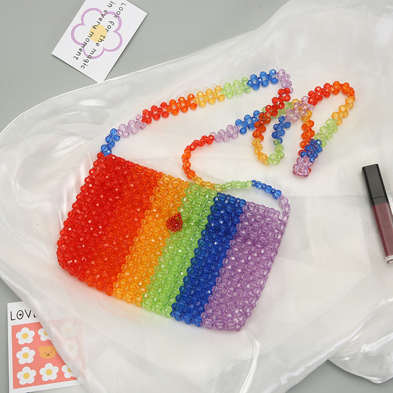 Brand High Quality New Style Creative Color-Block Handheld Pearl and Style Internet Celebrity Handwoven Pearl Woven Tote Elegant Decorative Storage Ne