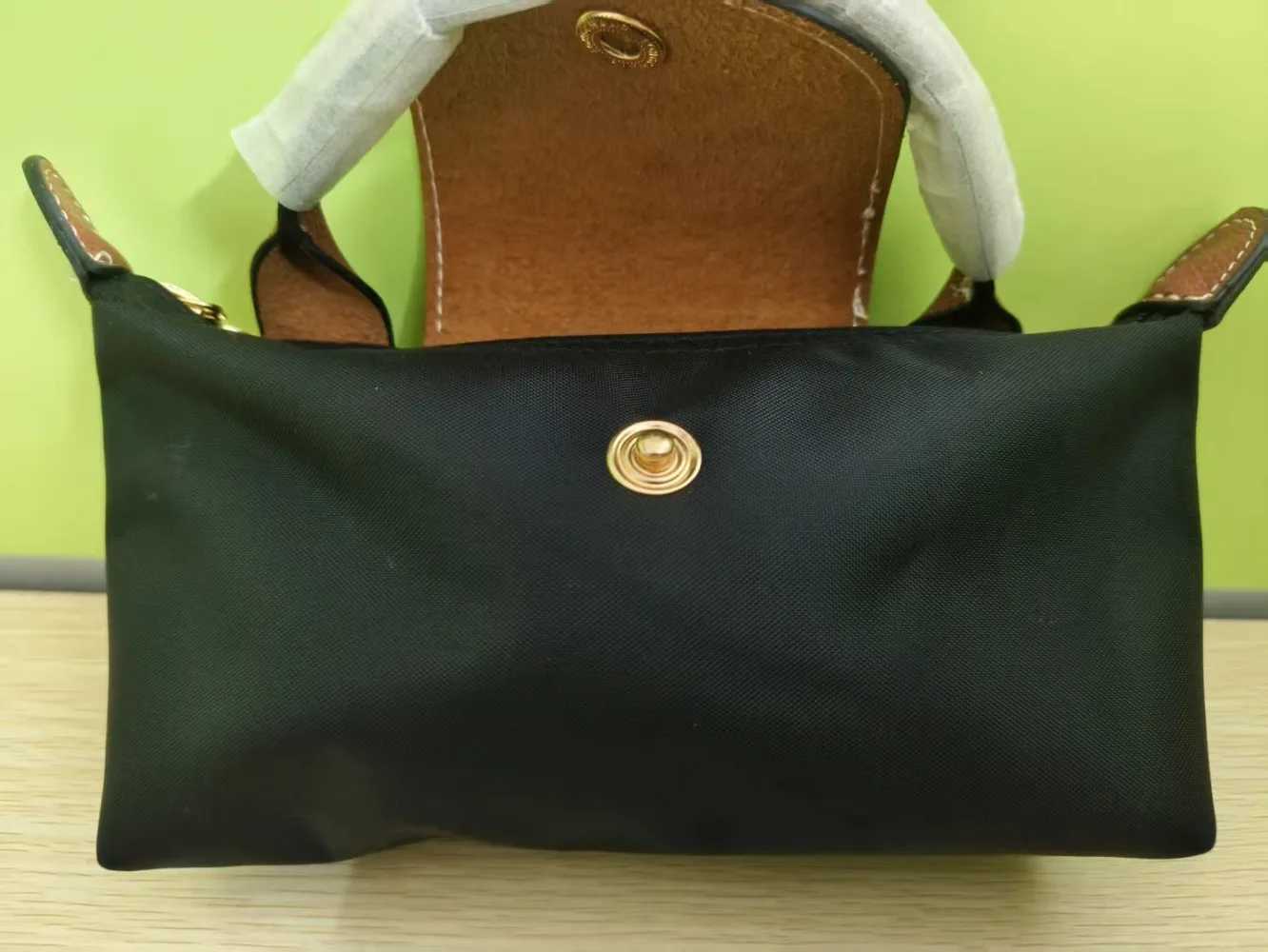 France unique perforated multifunctional large capacity new Mini nylon shoulder bag Z250527