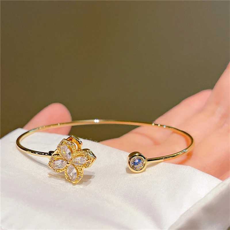Luxury Rotable Zircon Four Leaf Grass Gold Color Copper Open Bracelets for Women New Fashion Advanced Wedding Party Jewelry Gift W250526