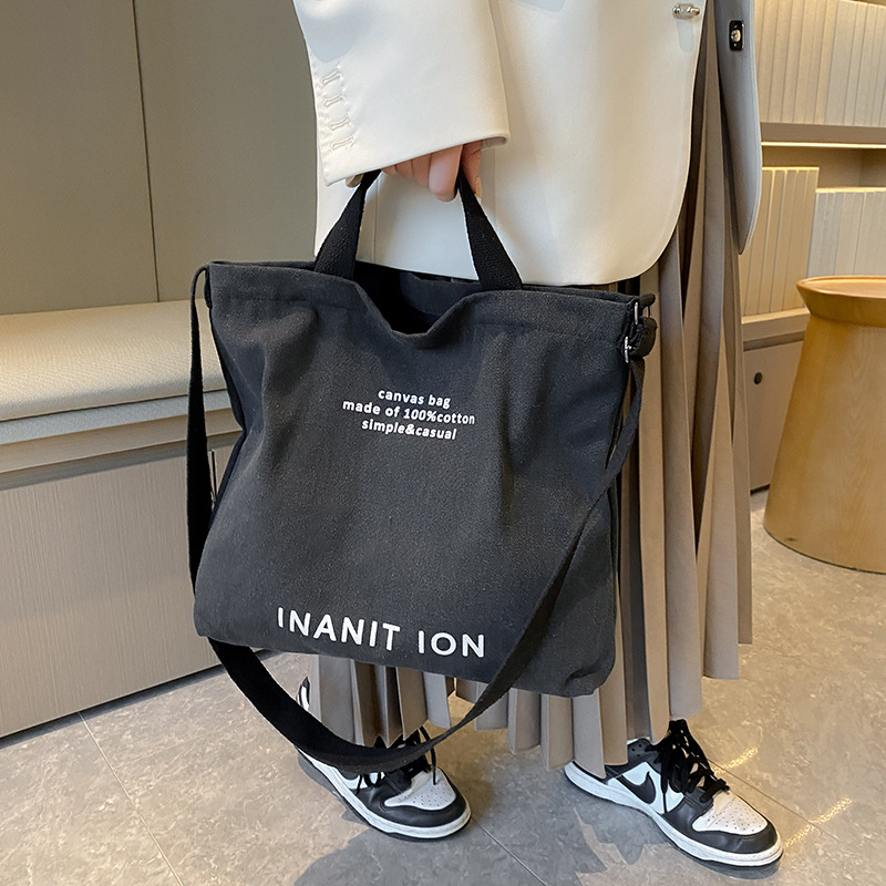 Free shipping designer Japanese canvas men's and women's new crossbody bag, washed canvas thickened handbag, large-capacity trendy urban art