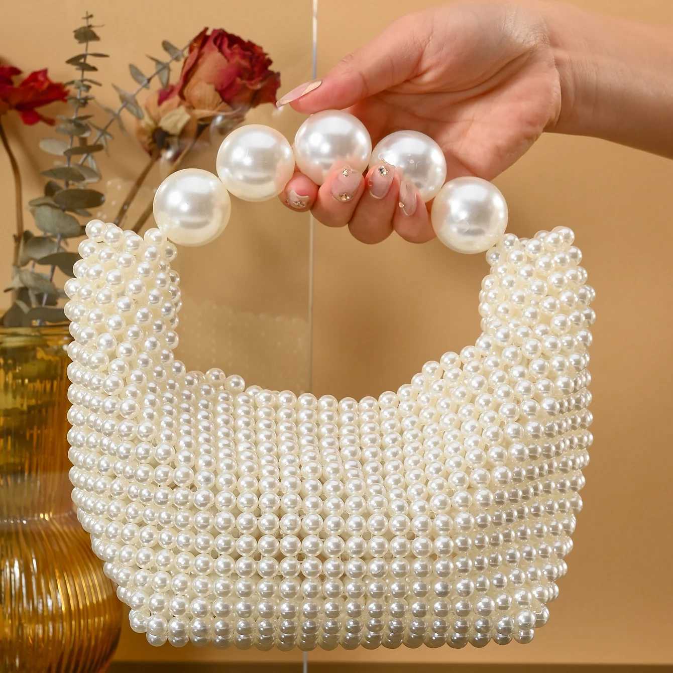European and American style new beaded handbag Summer womens pearl bag hand woven wrist bag Fashion temperament handbag W250527