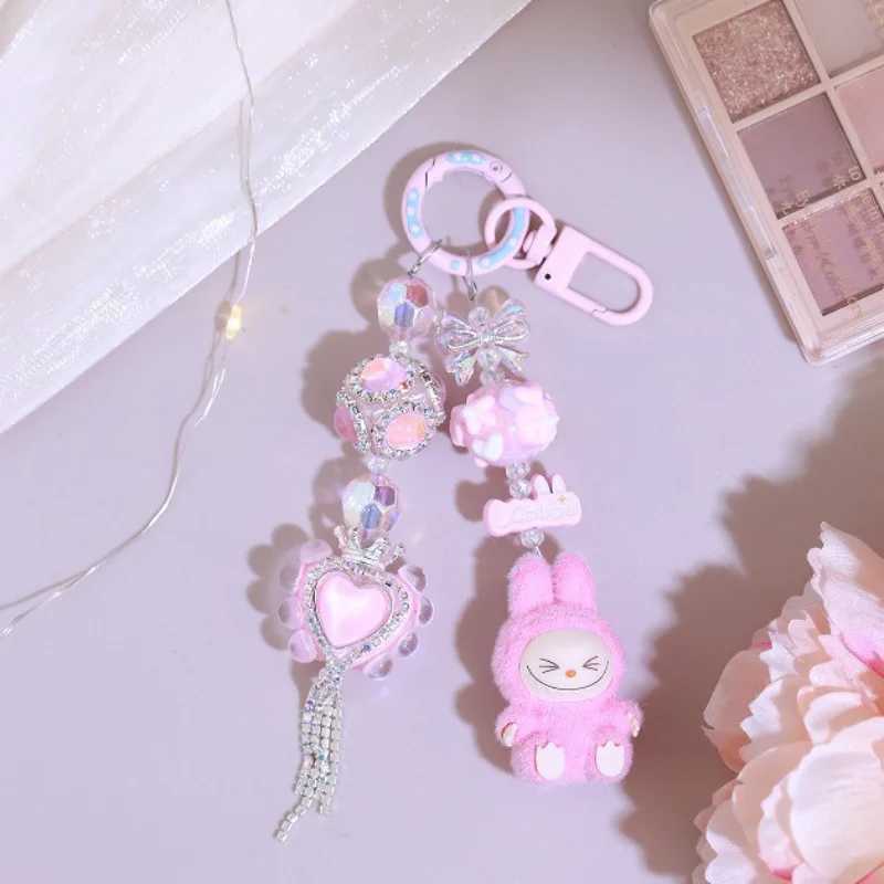 Cute Labubu Keychain Doll Couple Keyring Kawaii Cartoon Bowknot Phone Chain Bag Heart Pendant Charm Backpack Decoration Gift W250526