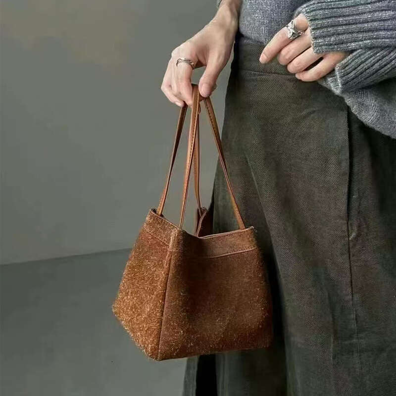 Top Layer Cowhide Niche Genuine Leather Wing Tote for Women New High end Handheld Shoulder Crossbody Bucket Bag
