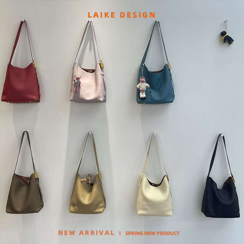 Summer New Niche Top Layer Cowhide Locking Wandering Genuine Leather Women's Commuter Large Capacity High-end Tote Bag