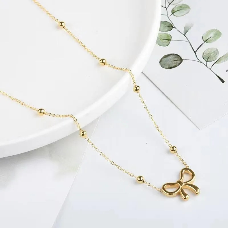 ANENJERY L316 Stainless Steel Beads Chain Hollow Bowknot Pendant Necklace for Women Niche Simple Jewery Accessory 250519