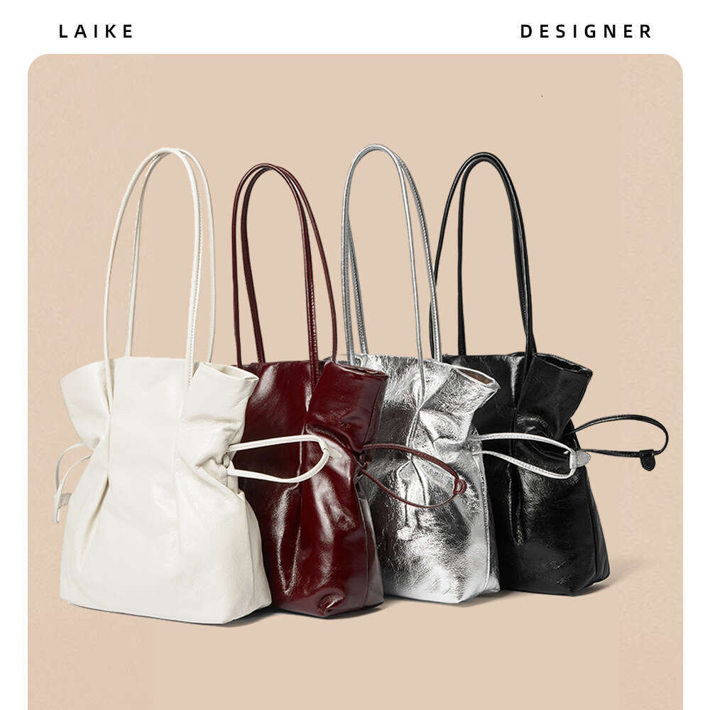 New French Style Niche Cowhide Handbag Lucky Shoulder Underarm Vase Small Waist Drawstring Fashion Women's Bag