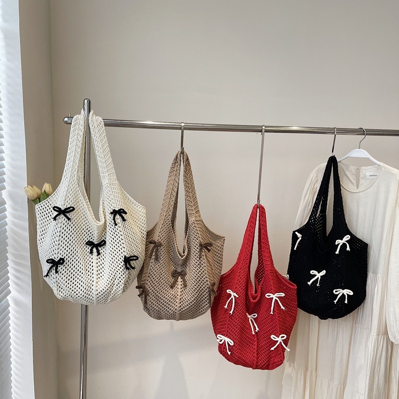 2025 New Summer Fashion Knitted Designer Women's Hollow Handbag New Fashion Knitted Bow Beach Shoulder Bag Trend