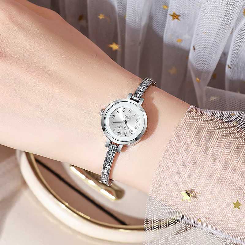 Womens high appearance level vivid exquisite Arabic numerals dial small dial steel band quartz watch. XJ250527