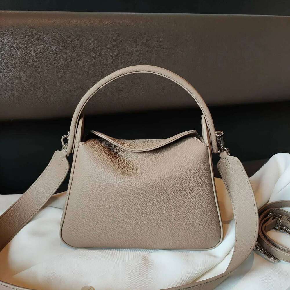 Genuine women's with large capacity and unique cigarette box design Made of soft leather one shoulder crossbody bag