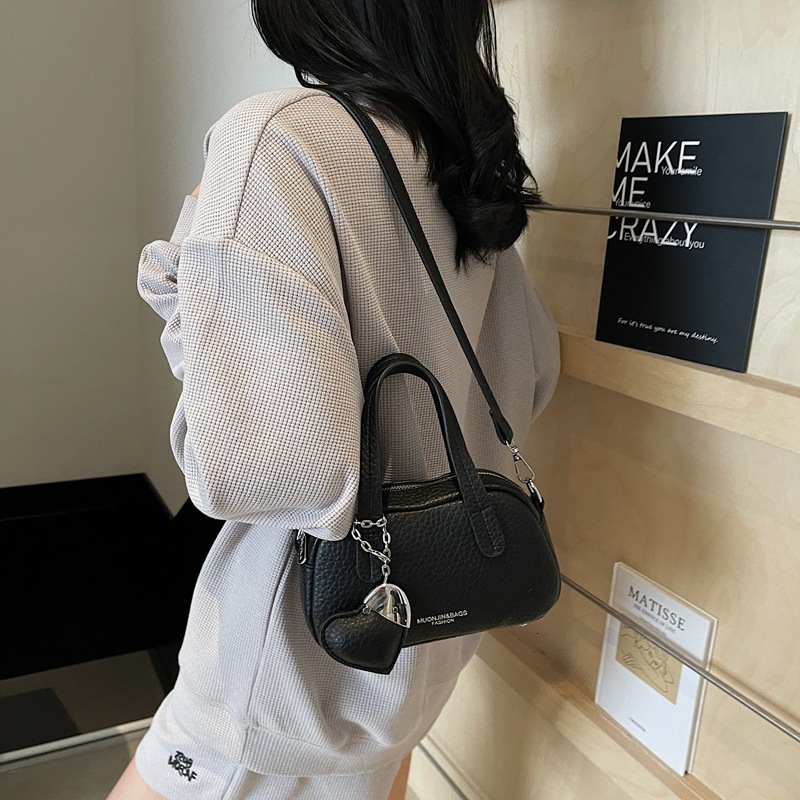 2025 New Lychee Pattern Fashion Designer Women's Handheld Pillow Western style Casual Simple Multi use Shoulder Cross Bag