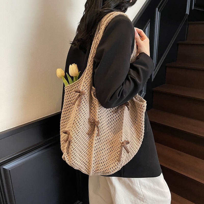 2025 New Summer Fashion Knitted Designer Women's Hollow Handbag New Fashion Knitted Bow Beach Shoulder Bag Trend