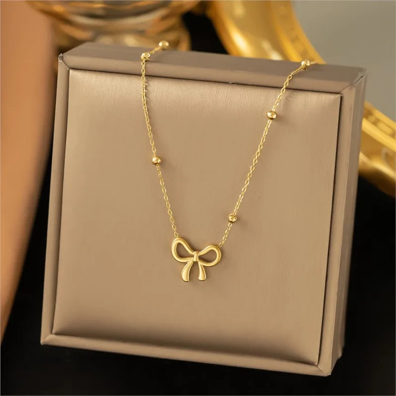 ANENJERY L316 Stainless Steel Beads Chain Hollow Bowknot Pendant Necklace for Women Niche Simple Jewery Accessory 250519