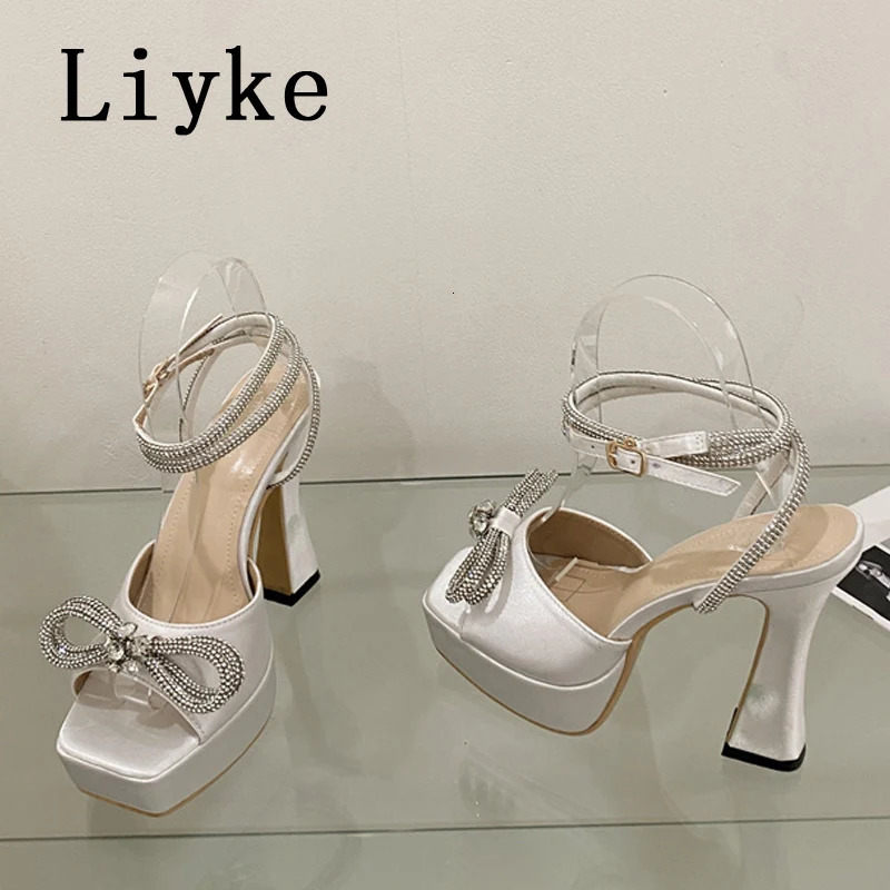 Liyke Super High Sexy Sandals Ladies 2025 Summer Open Toe Crystal Bowknot Platform Heels Party Wedding Shoes Women Black White 250526