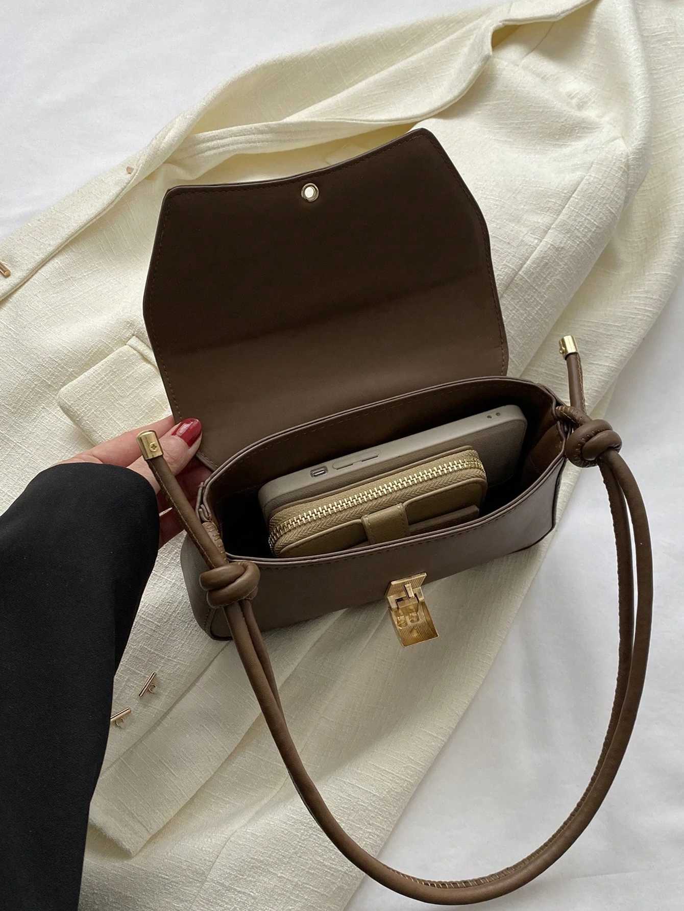 Fashionable womens armpit bag metal buckle decoration design shoulder bag suitable for shopping commuting and travel. Y250528