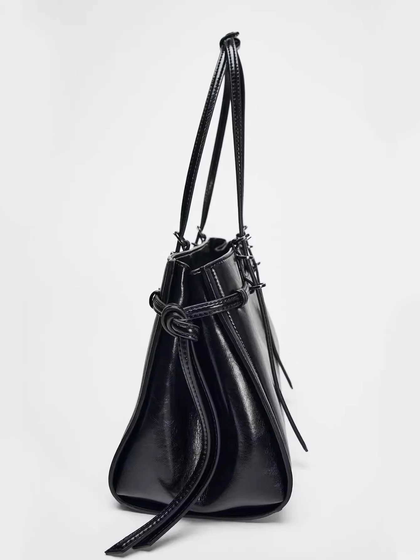 New atmospheric handheld womens bag black extended version double shoulder strap fashionable and simple casual shoulder bag Y250528