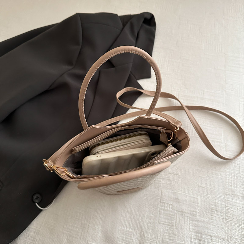 2025 new color blocked niche female fashion designer multifunctional cross body texture handheld bucket bag