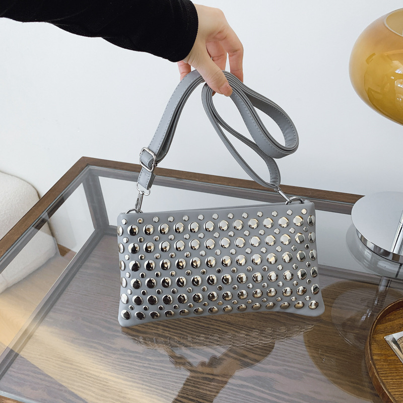 Luxury Brand Designer Bag Personalized Trendy Dot Rivet Hand-Held Women's 2025 New Motorcycle Versatile Armpit Tote Bag