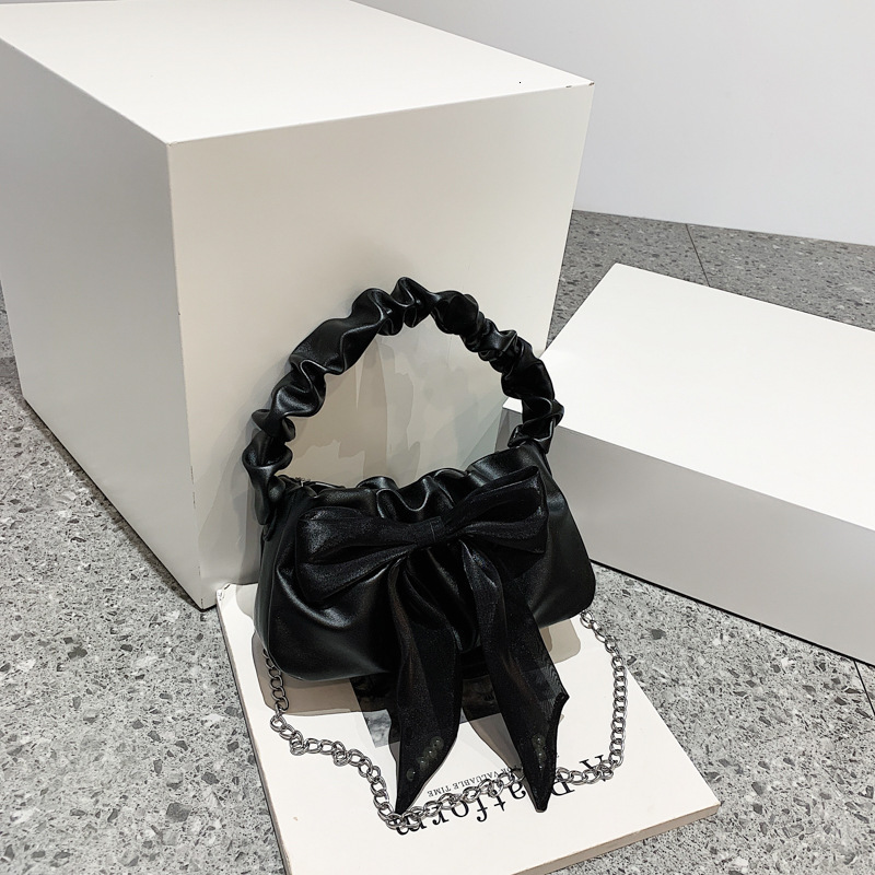 Spring and summer new popular women's small handbag fashionable and sweet handbag crossbody bag pleated handbag design bow design designer armpit
