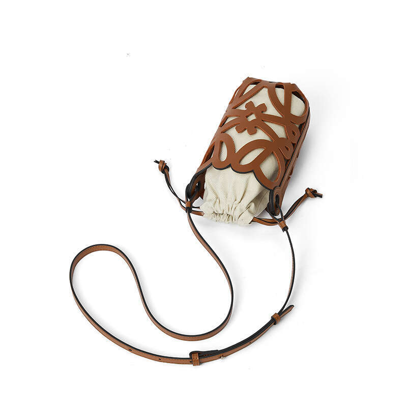 2024 New Crossbody Bucket Hollow Drawstring Canvas Inner Pocket Niche Design Fashion Versatile Mini Bag
