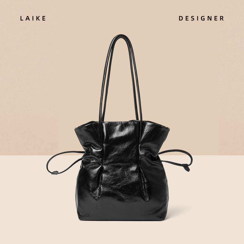 New French Style Niche Cowhide Handbag Lucky Shoulder Underarm Vase Small Waist Drawstring Fashion Women's Bag